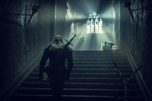 Geralt tuż przed walką ze strzygą, wspina się po schodach zamku